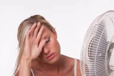 Hot woman needing Air Conditioning Repair